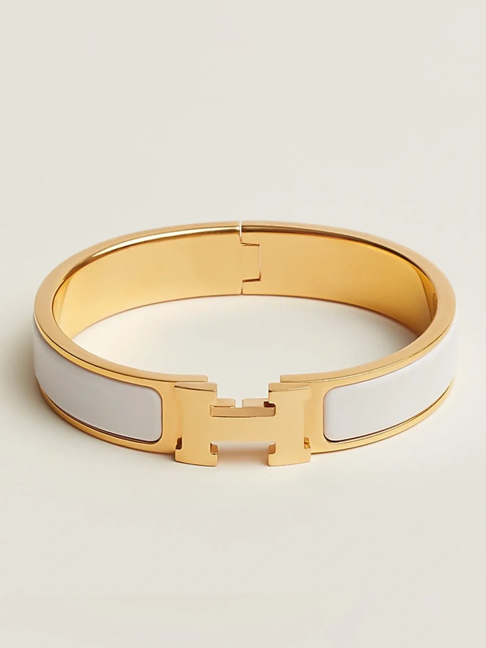 Hermès Clic H Gold and White Enamel Bracelet